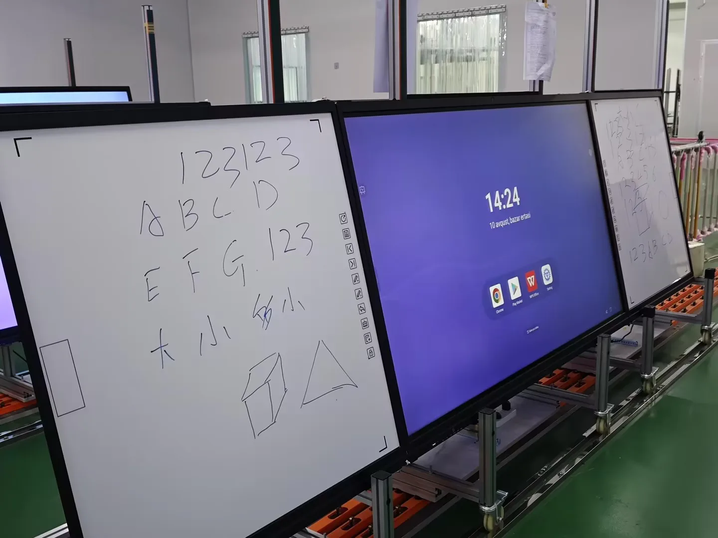 Interactive side boards installed left and right of the IFPD, with the shortcut icon strip visible on the edge