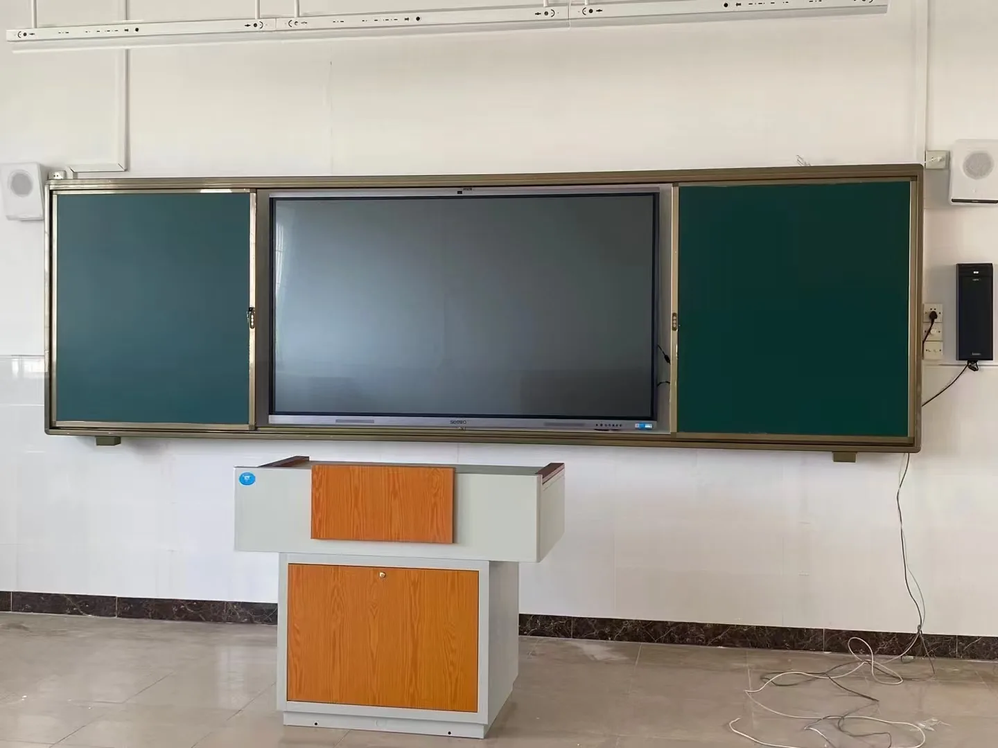 Sliding chalkboard with interactive panel combination board for classrooms