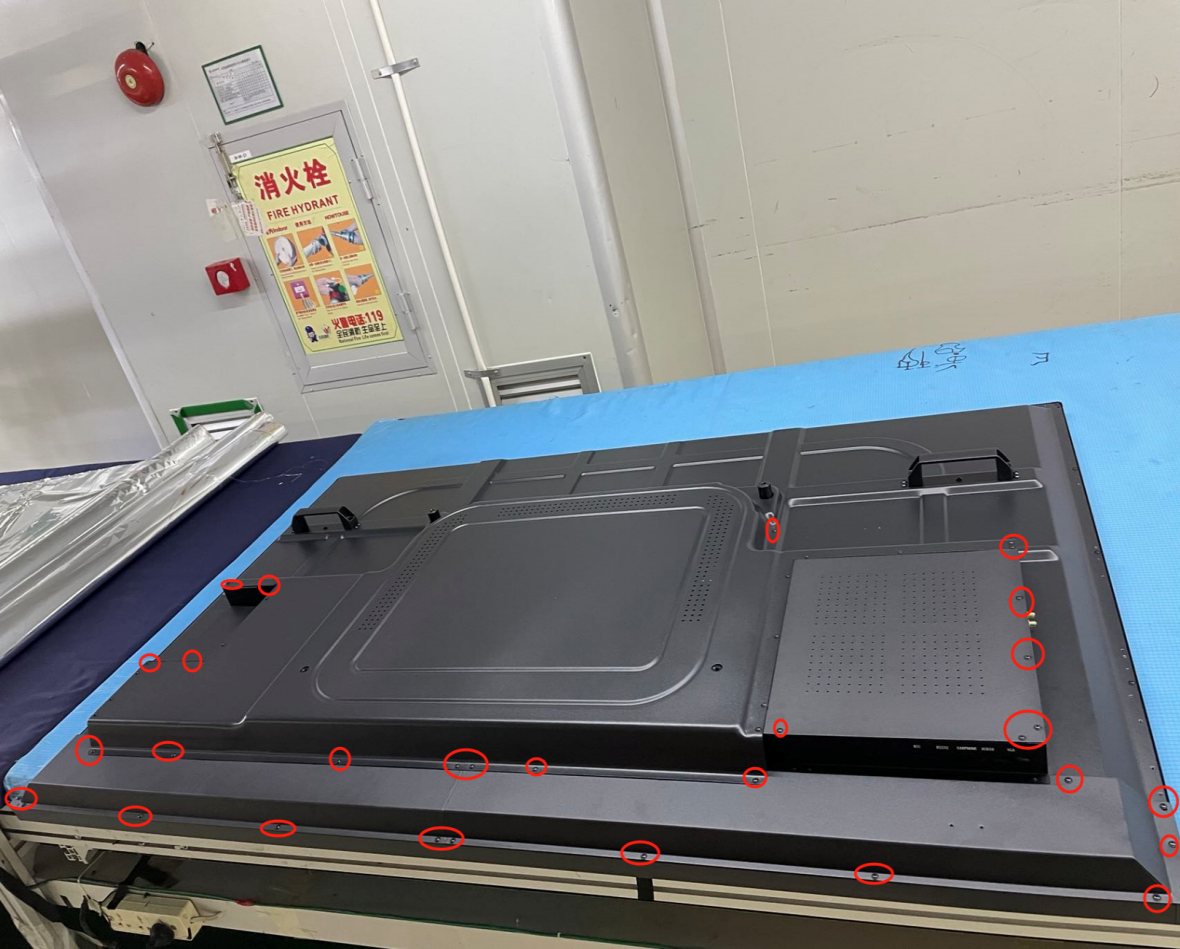 Step 1a — remove the screws circled in red to release the two back covers.