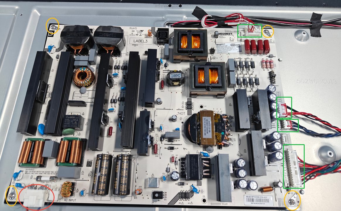 Step 2 — unscrew and lift the power / main board after disconnecting its cables.