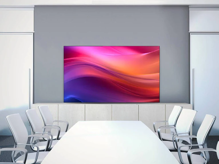 Riotouch 55-inch COB LED display unit installed in a conference room, running from a direct HDMI input