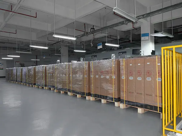 LED poster displays passing final QC inspection and packaging for global export shipping